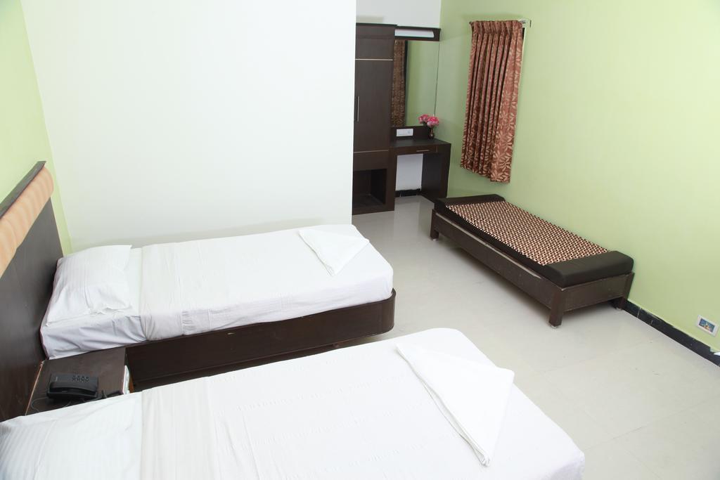 فندق Jeyam Residency, كومباكونام الغرفة الصورة